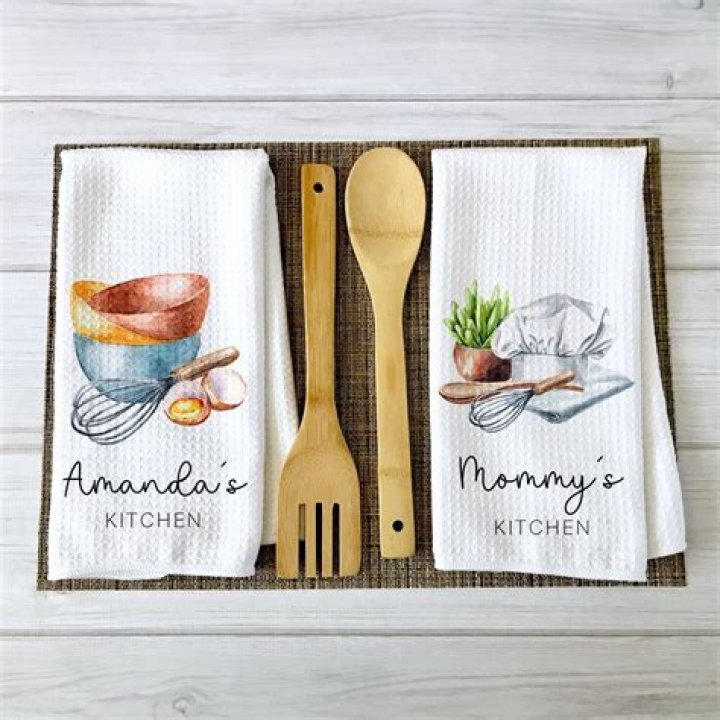 Can I wash kitchen towels with bath towels?
