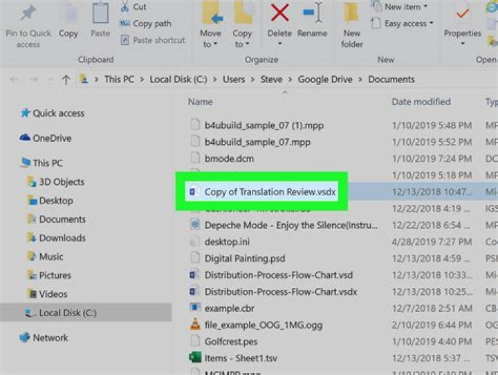 How do I open a file in Vista?