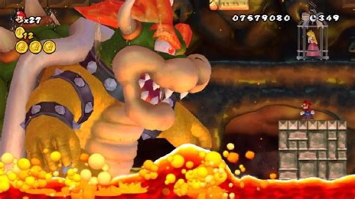 How do you defeat Bowser in Super Mario Bros?
