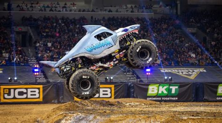 How do you unlock trucks in Monster Jam?