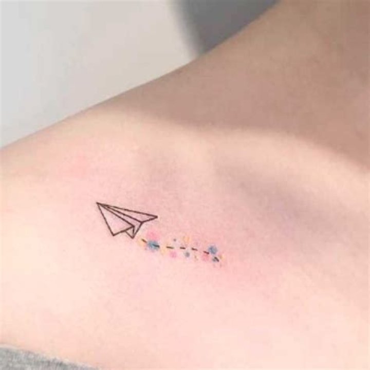 What does a paper plane tattoo mean?