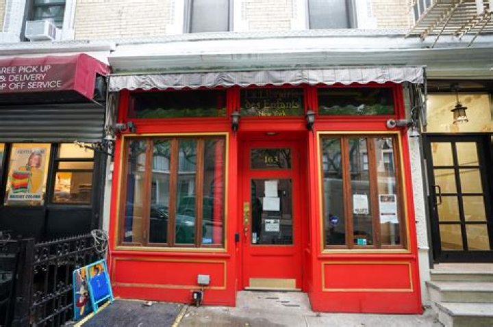 What does the owner of the Bombshop call his mother?