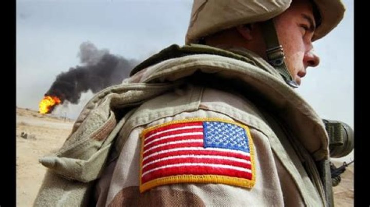 Why is the American flag backwards on firefighter uniforms?